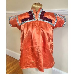 Silky embroidered snap front blouse made & bought in Mexico.